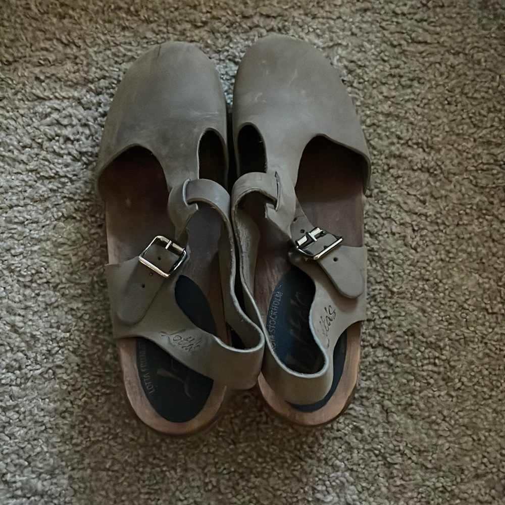 Naturally distressed olive colored lotta clogs